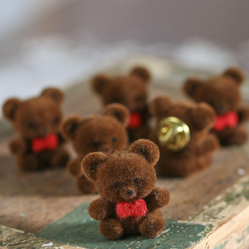 brown teddy bear pin cushion